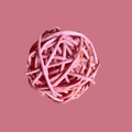 Natural vine ball rabbit chew toy infused with fruit juice.